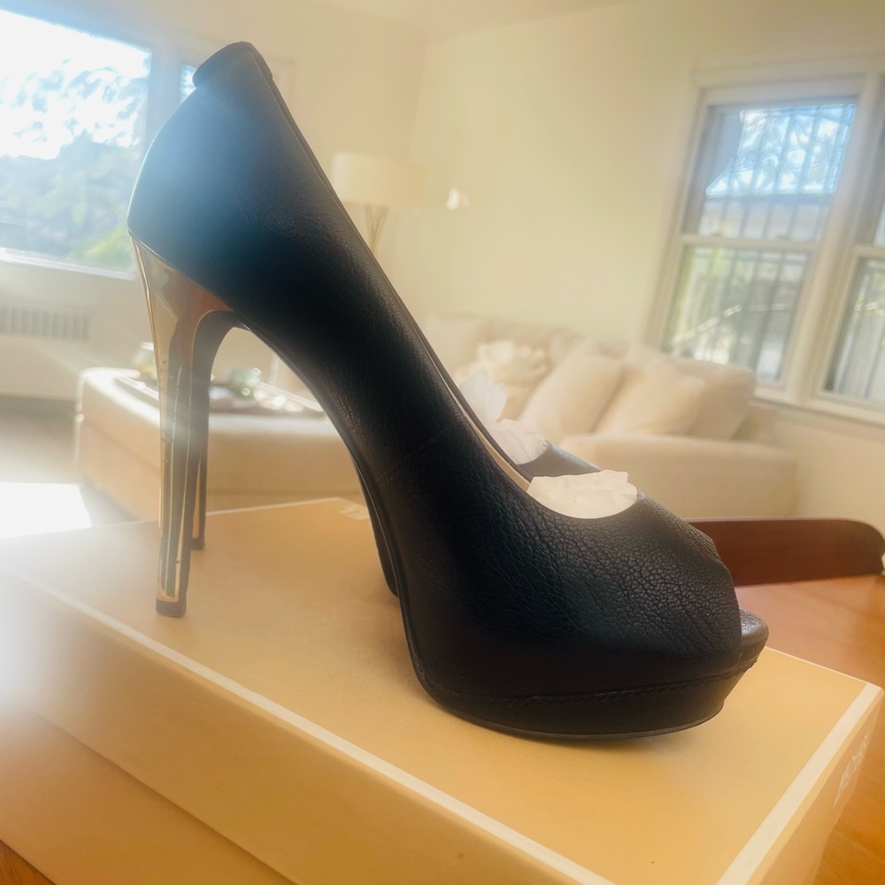 Used Michael Kors platform shoes size 7 US